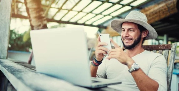 Man using phone abroad