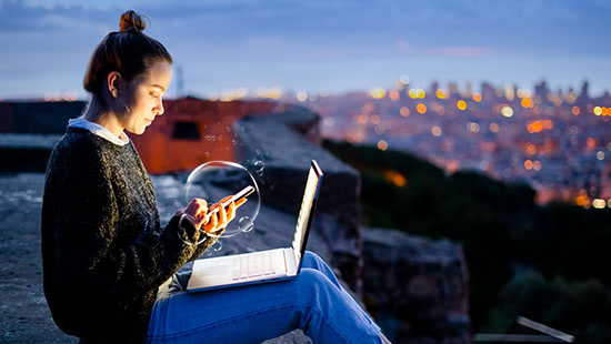 Woman using a 5G phone