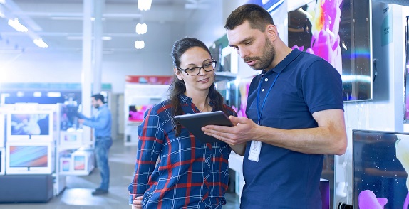 Colleagues working on a G-Cloud framework using an O2 tablet