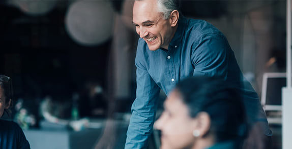 Man smiling in an office