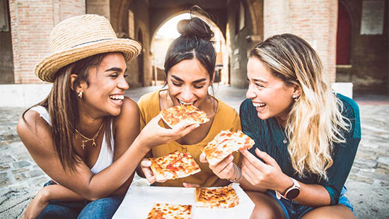 people eating pizza