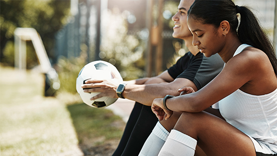 people looking at smartwatch