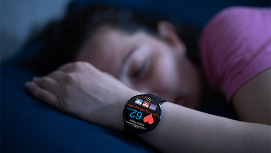 person sleeping with smartwatch