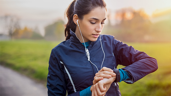 person looking at smartwatch on their wrist