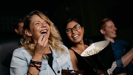 people eating popcorn