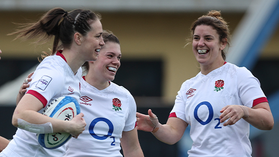 women playing rugby