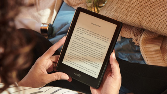person holding a kindle