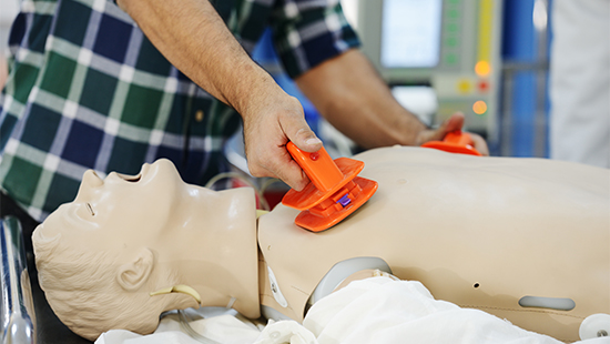 defibrillators on a dummy