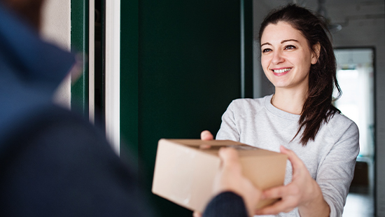 person handing another person a parcel