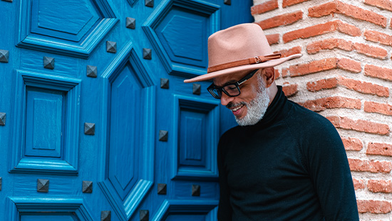 person in front of a blue door