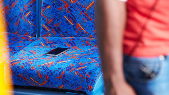 phone on a bus seat