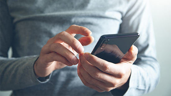 Man holding mobile phone