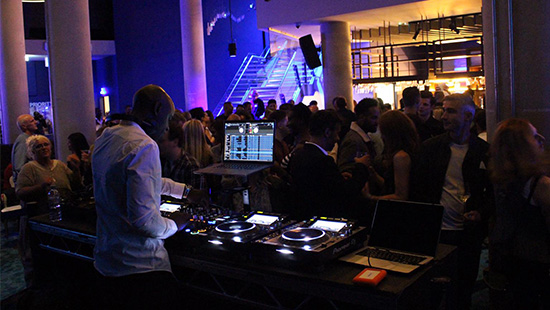 DJ and crowd of people in O2 Blueroom