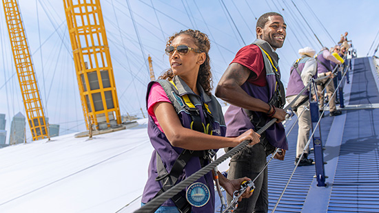 2 people climbing The O2 dome