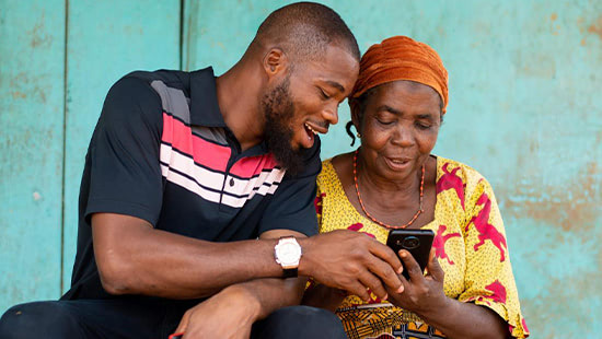 people looking at a phone