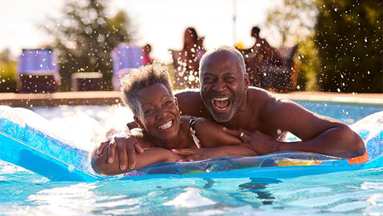 couple on a pool float