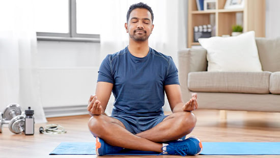 Man in sitting yoga pose